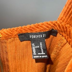 Women’s overall style dress. Orange